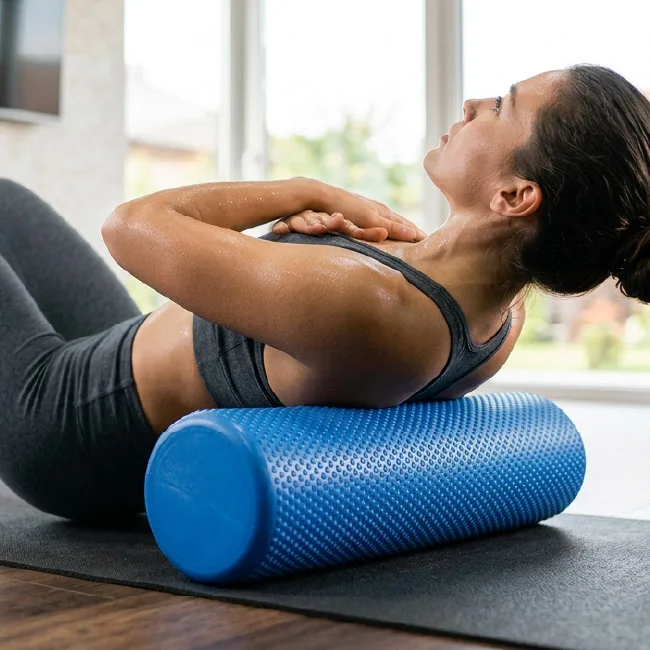 Foam roller being used for muscle recovery after a workout