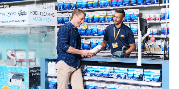 Clark Rubber expert helping a customer find the right pool chemicals