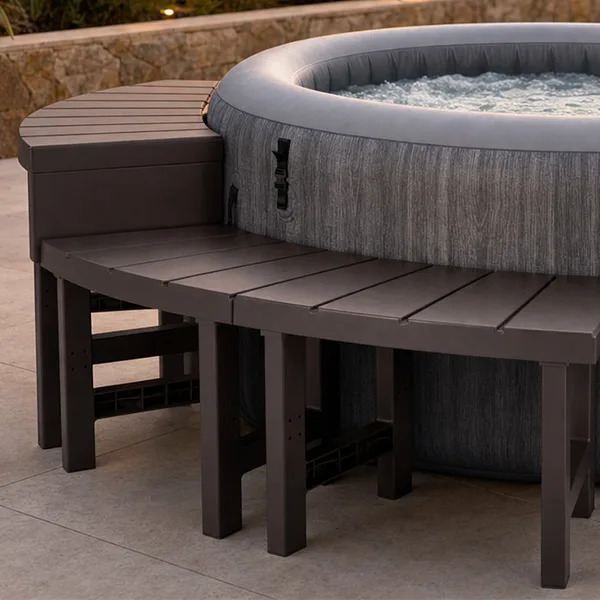 Spa benches positioned around an inflatable spa. Spa benches providing comfortable access and seating around an inflatable spa.