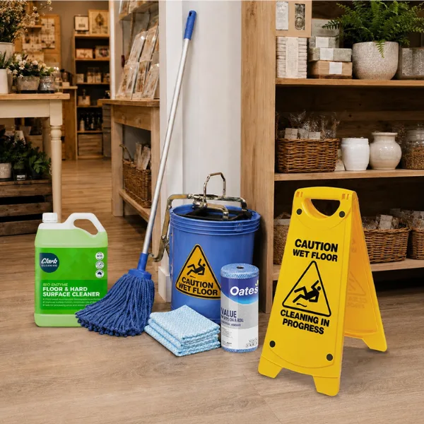 Essential commercial cleaning products used in a retail business cleaning pack including mop, bucket, gloves, cloths, a vacuum cleaner and wet floor sign.