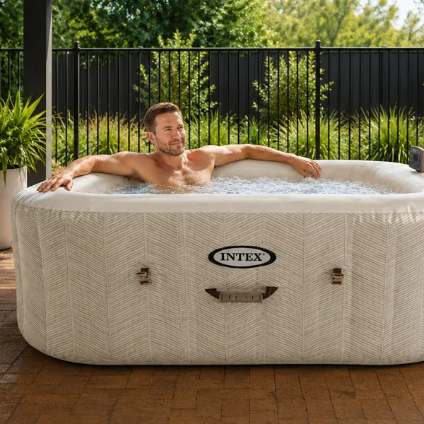 Dad relaxing in an inflatable spa from Clark Rubber on Father's Day